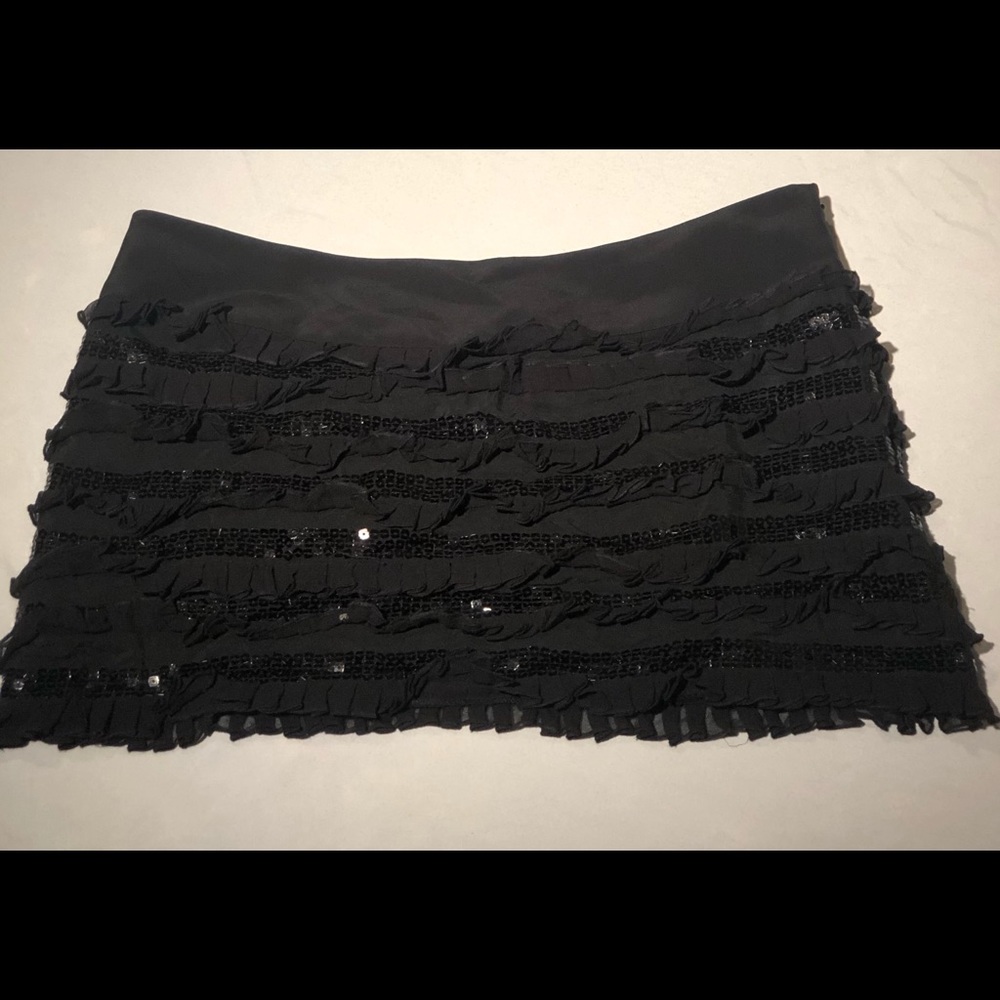 bebe ruffled black skirt with sequin